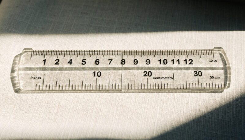 a school ruler laid flat showing the 12 inch mark