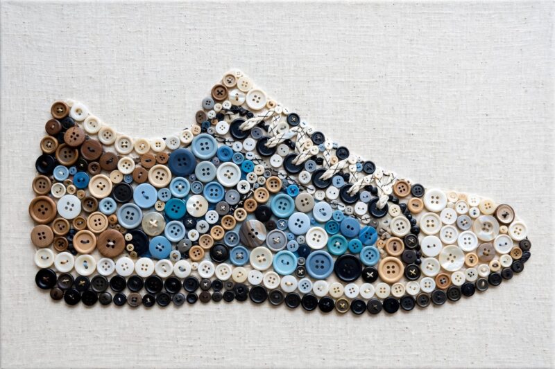 button mosaic sneaker