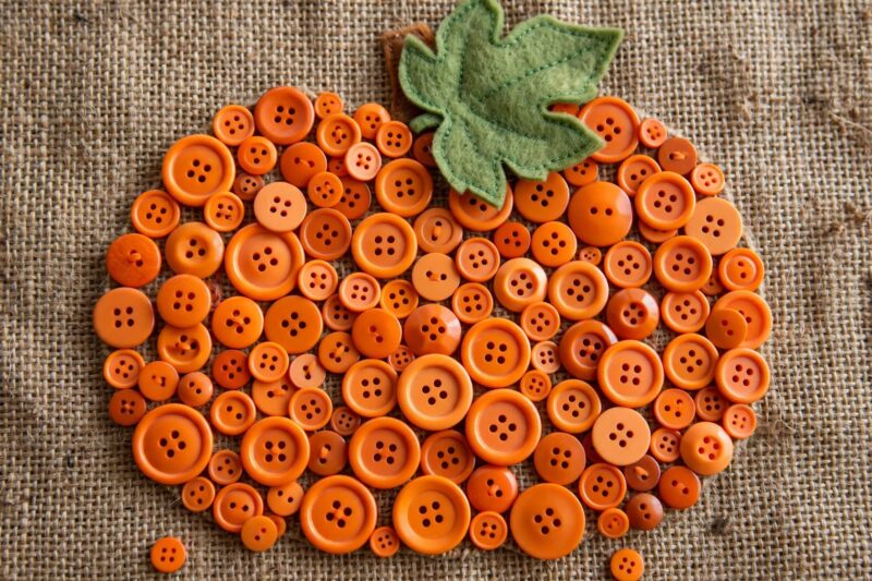 button pumpkin flatlay