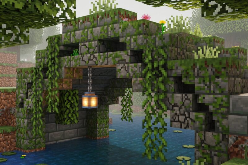 mossy stone arch bridge