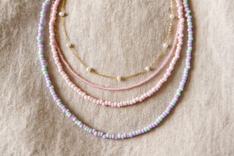 pastel necklace flatlay